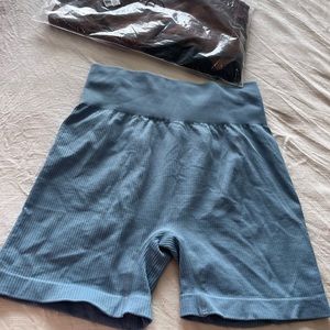 Set of three blue brown and black biker shorts ribbed